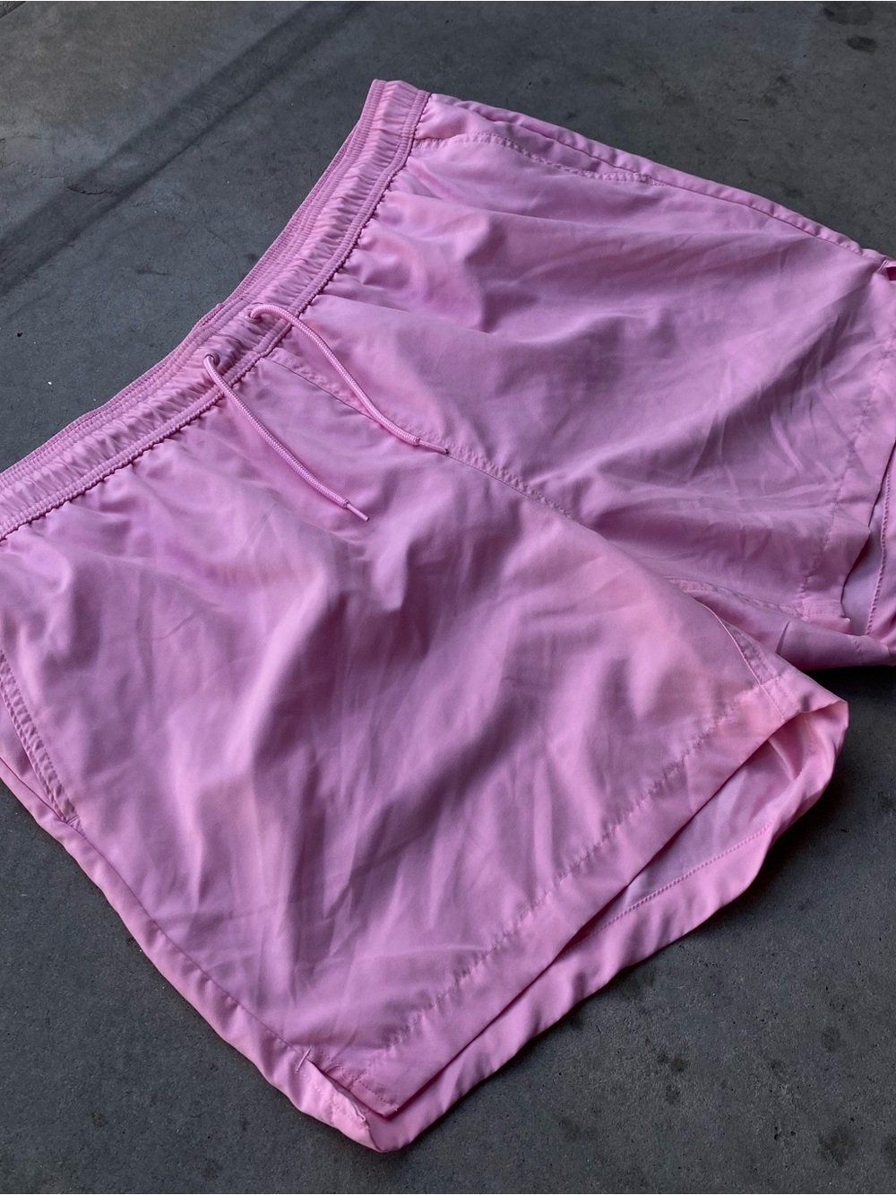 Pink George swim trunks with white mesh lining